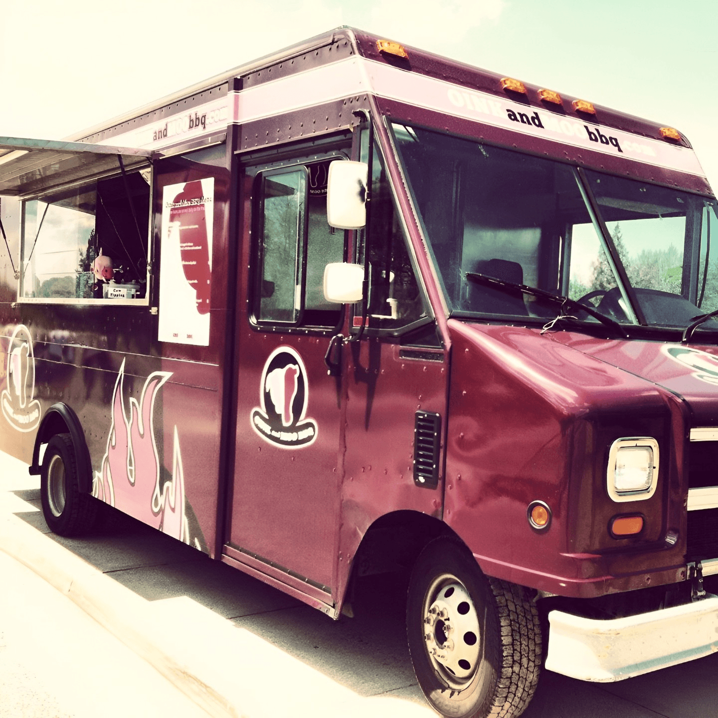 Oink and Moo BBQ food truck at a catered event in NJ