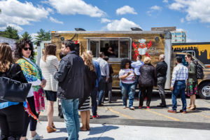 Busy local seafood food truck, Angry Archies serving crowds